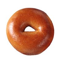 A plain bagel, the ring-shaped bread that moved from Ashkenazi bakeries into North American food culture.