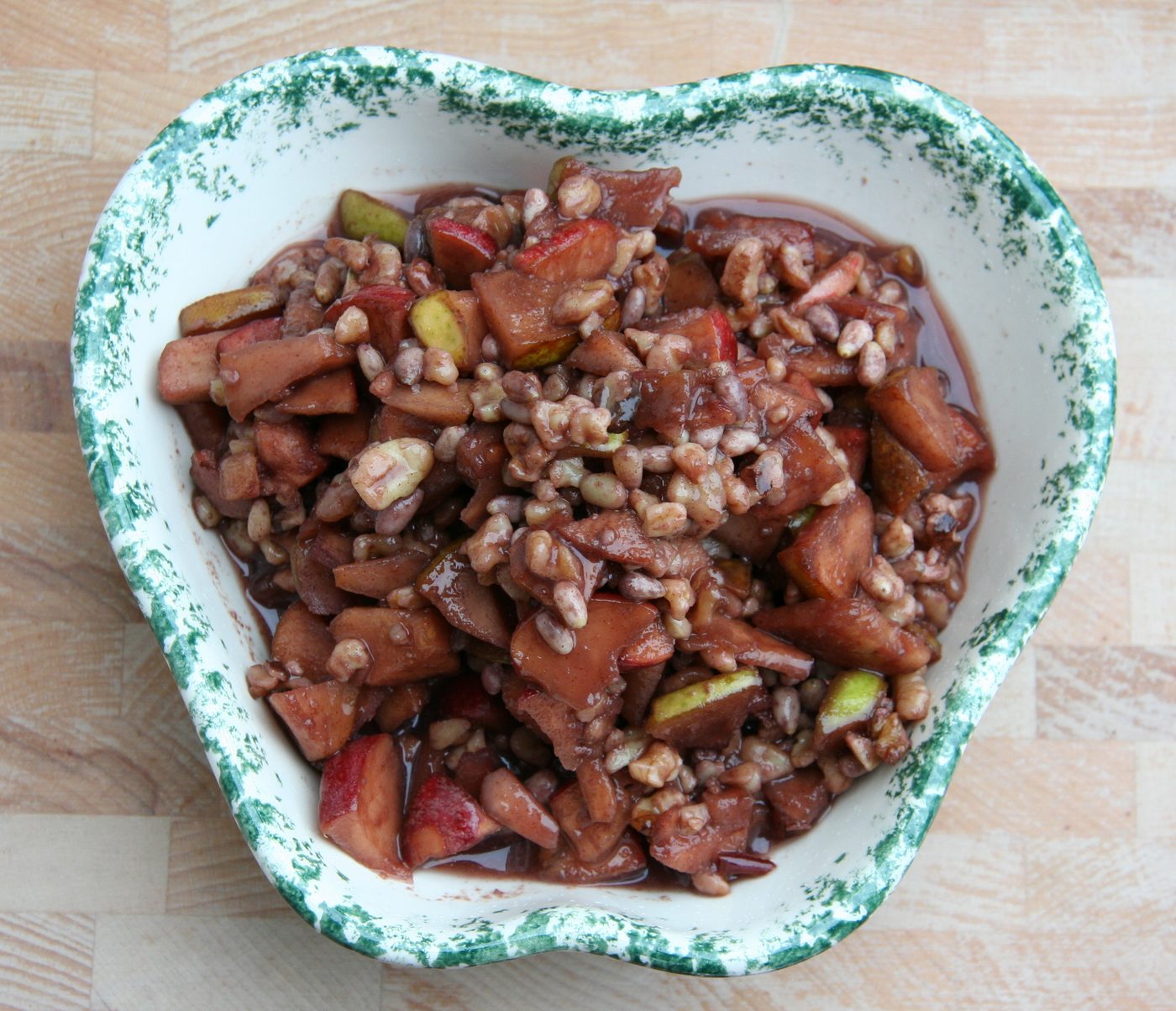 Charoset prepared for Passover, one local version of a symbol whose ingredients changed with every migration.