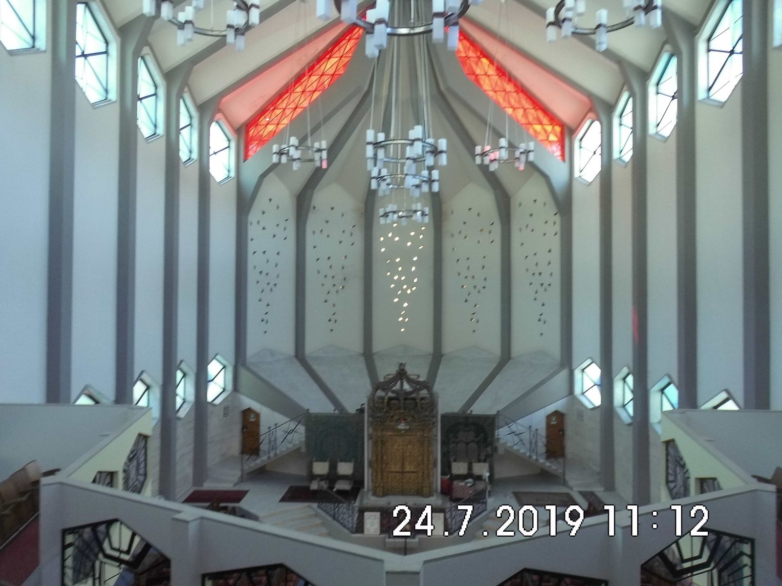 Interior of the modernist Great Synagogue of Livorno, rebuilt in 1962, looking towards the historic gilded ark brought from the synagogue of Pesaro