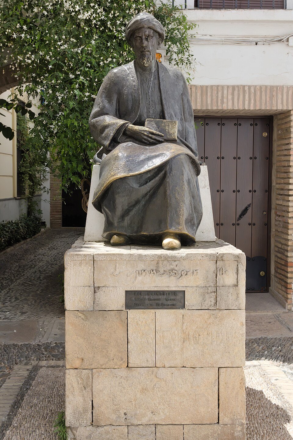 Seated bronze statue of Maimonides in the old Jewish quarter of Córdoba, Spain