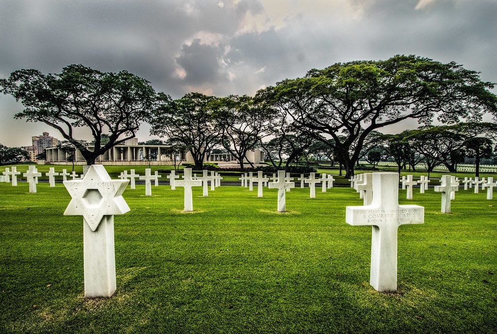 A Star of David grave marker among military graves at the Manila Jewish Cemetery today.