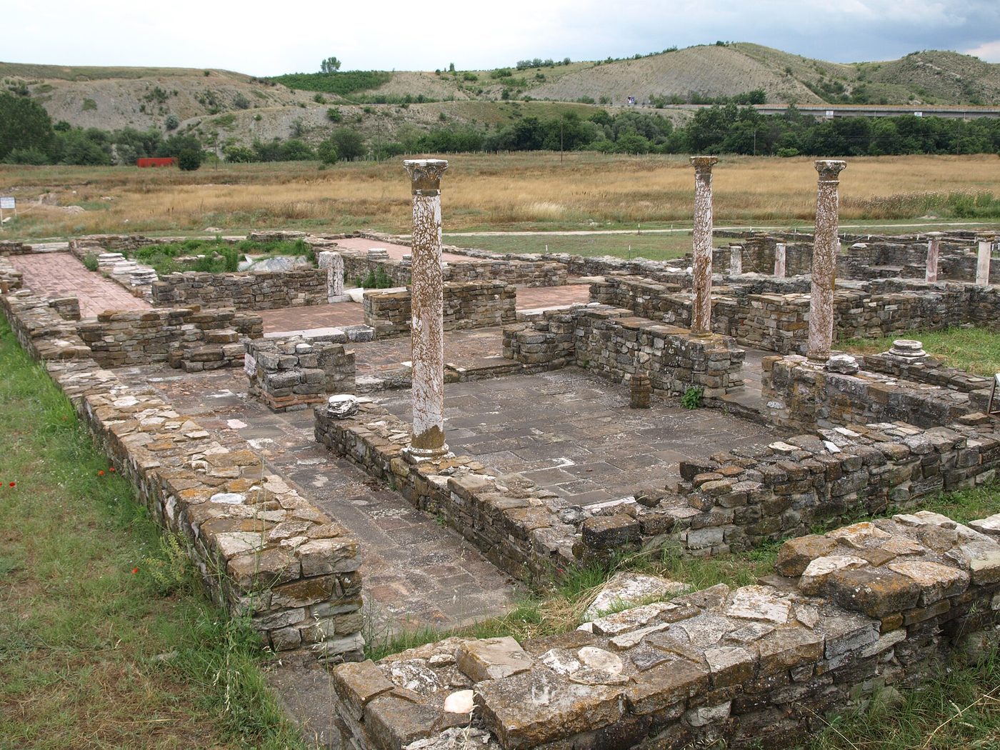 Today, the excavated Roman site at Stobi stretching across the valley, used as site context.