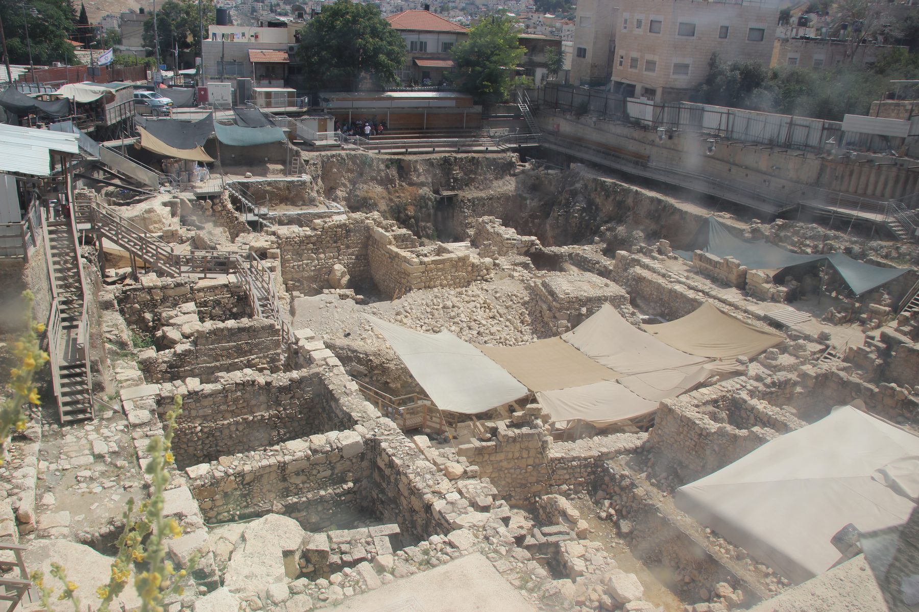 Archaeological excavation showing stone foundations and ramparts from the Seleucid Akra fortress, City of David, Jerusalem