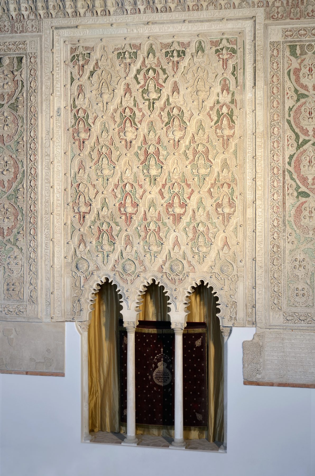 Carved stone wall panel with Hebrew inscriptions and Mudéjar geometric patterns, El Transito Synagogue, Toledo