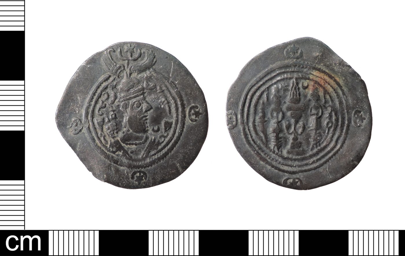 Silver drachm of Khosrow II, Sasanian king of Iran - obverse showing the king's crowned bust, reverse showing a Zoroastrian fire altar with two attendants