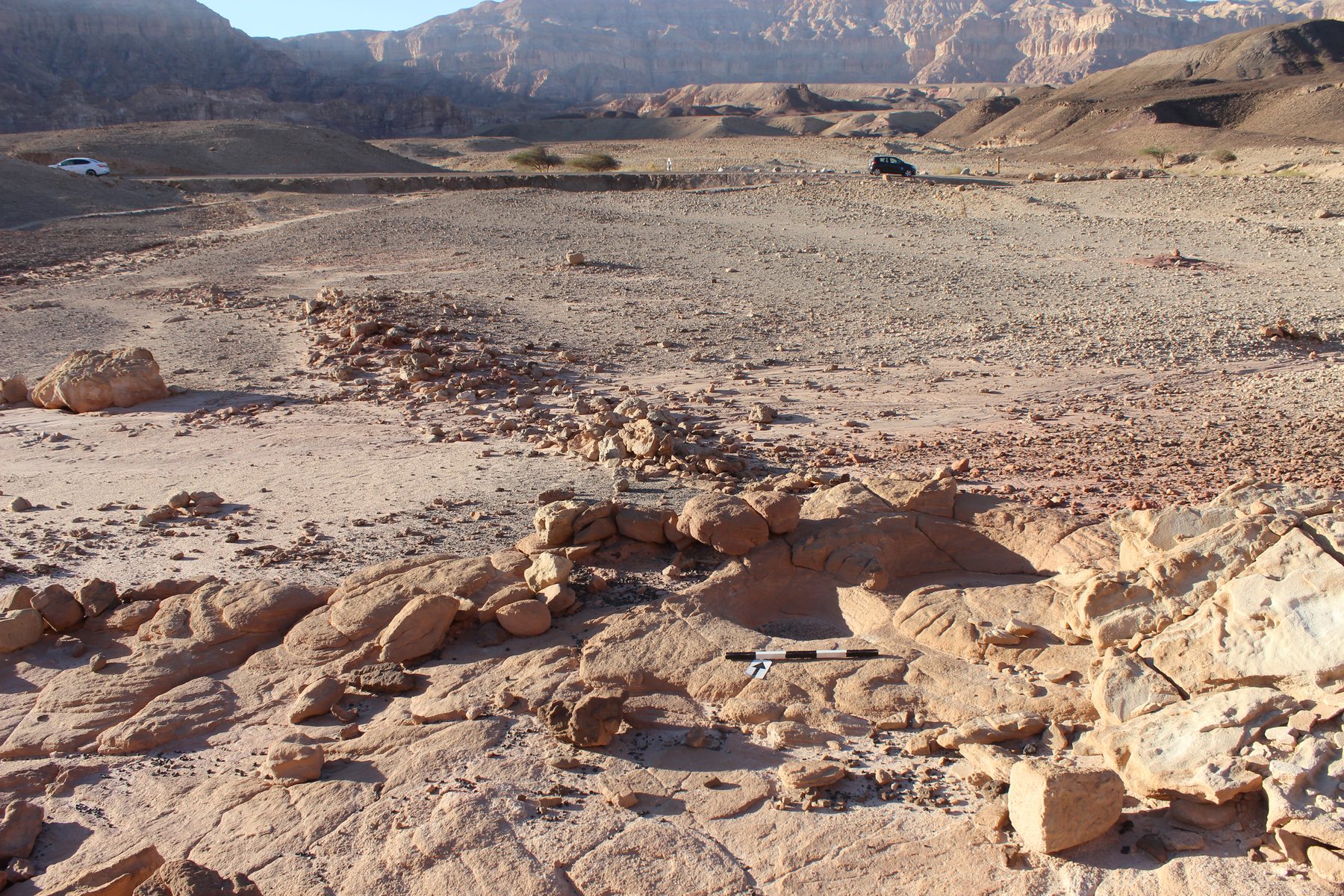 Ancient copper-smelting furnace remains and slag scattered across excavation site at Timna, in the Aravah desert north of Eilat.