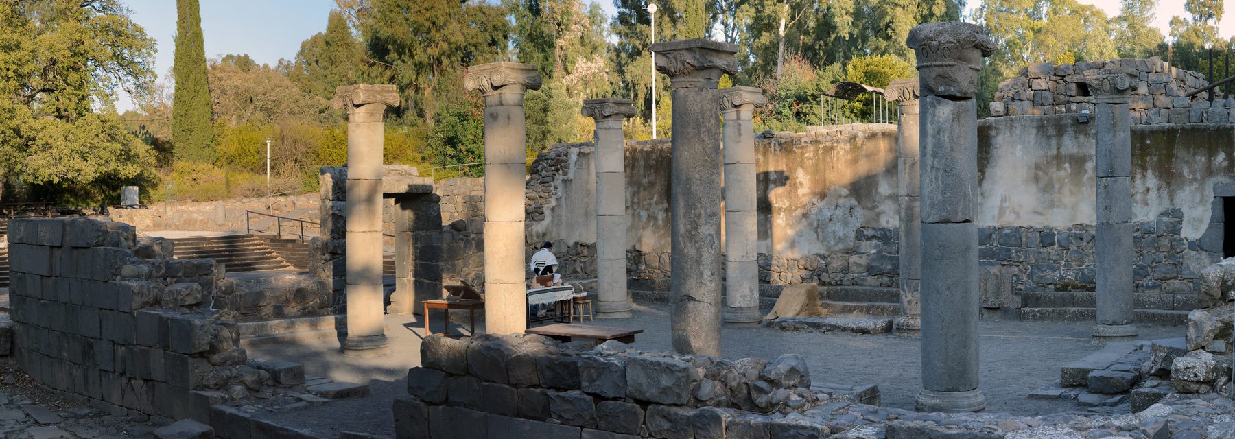Basalt columns and reconstructed buildings at the Qatzrin Ancient Village synagogue and courtyard, Golan Heights