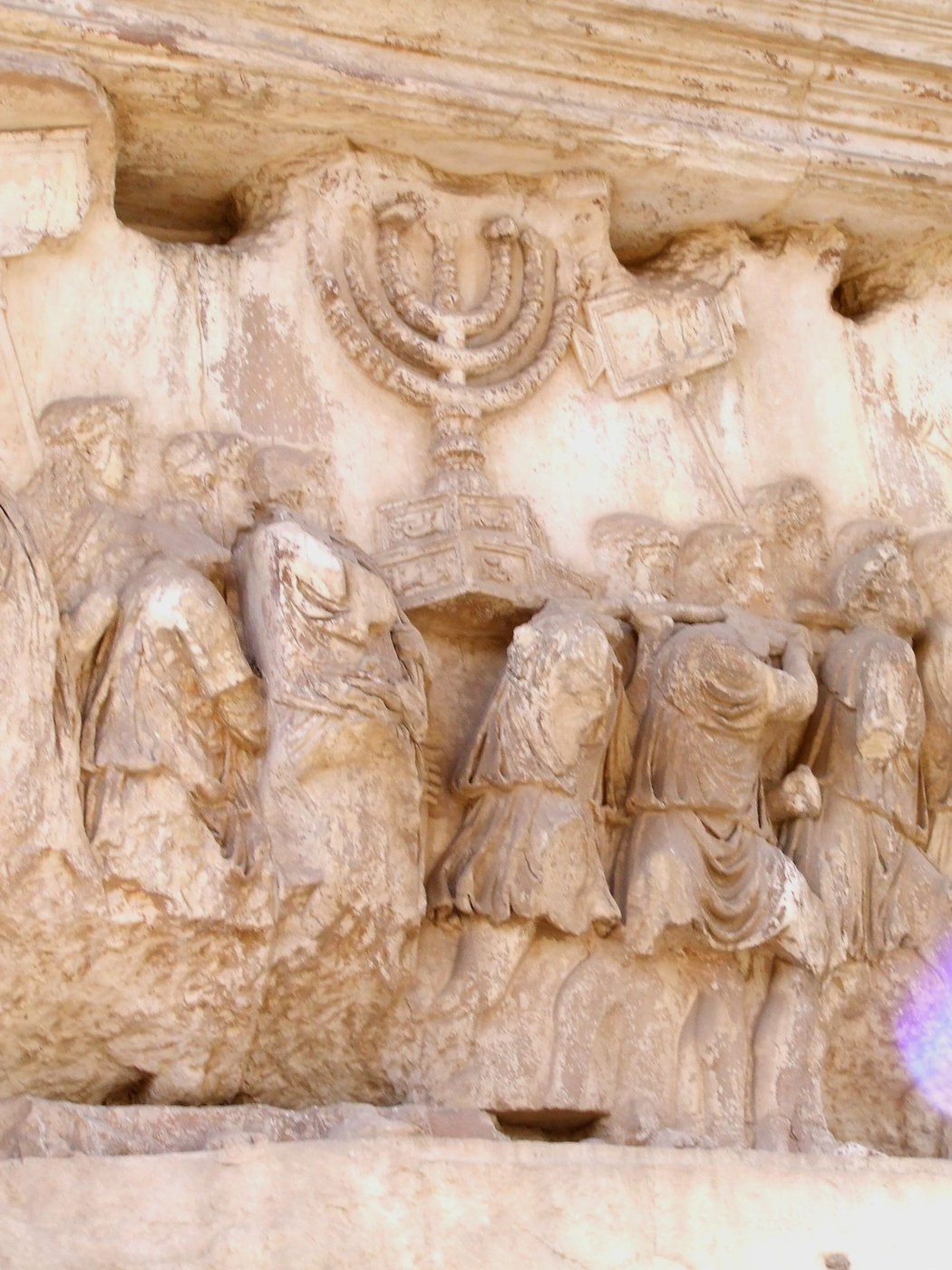 Roman marble relief of soldiers carrying the menorah from the Jerusalem Temple.