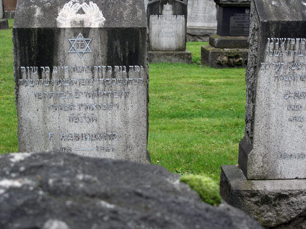 Jewish headstones with pebbles in a Vancouver cemetery.