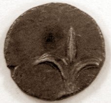 Obverse and reverse of a tiny silver Yehud coin showing a lily design, inscribed with paleo-Hebrew YHD lettering